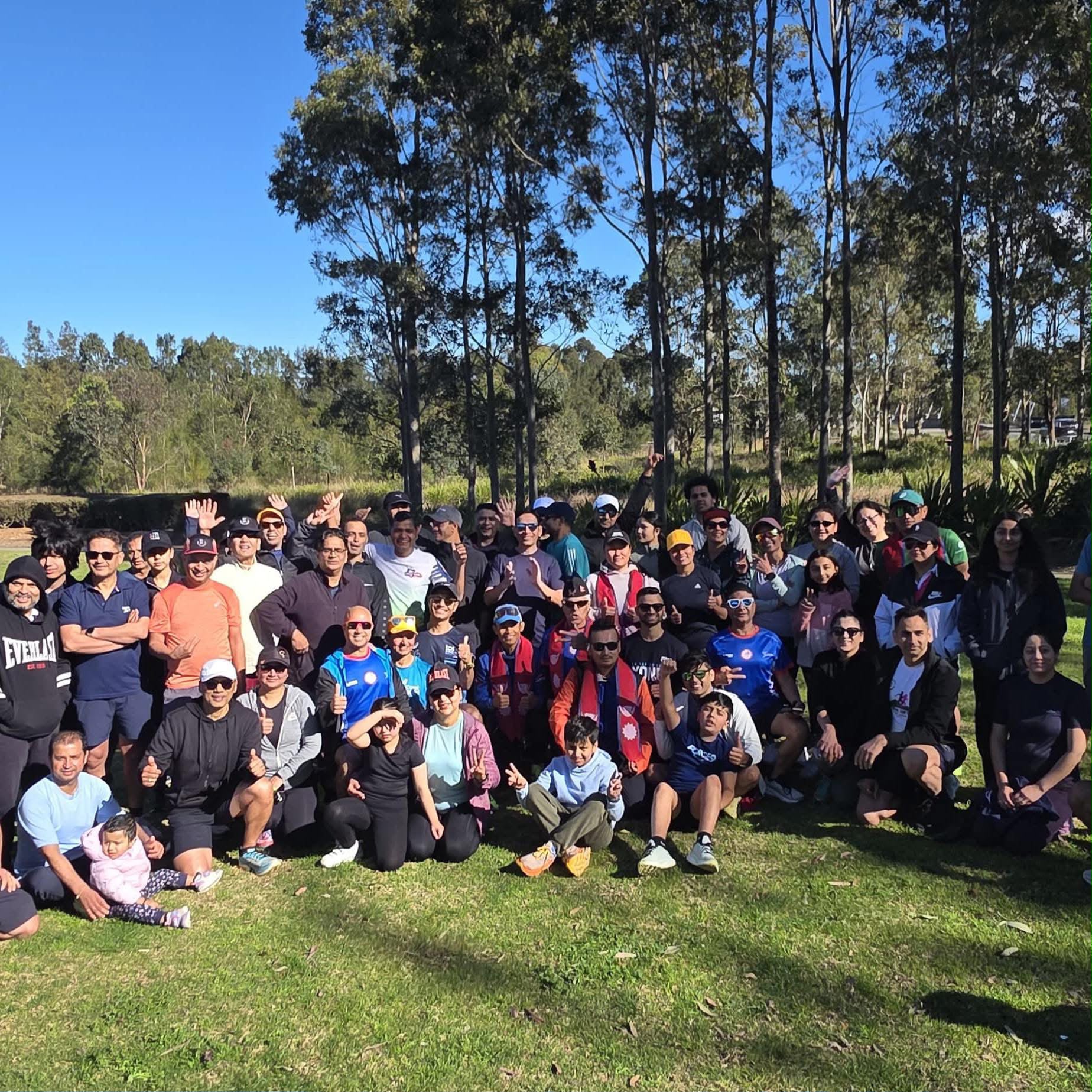 Nepal Run Australia members gathered in the park after a weekend run